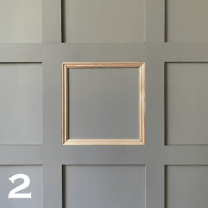 MDF Wall Panelling with bead moulding. Painted in grey.