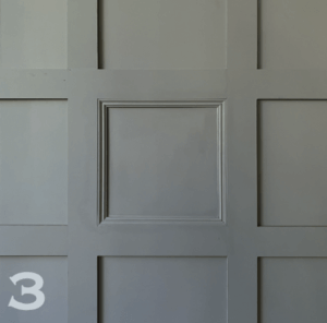 MDF Wall Panelling with bead moulding. Painted in grey.